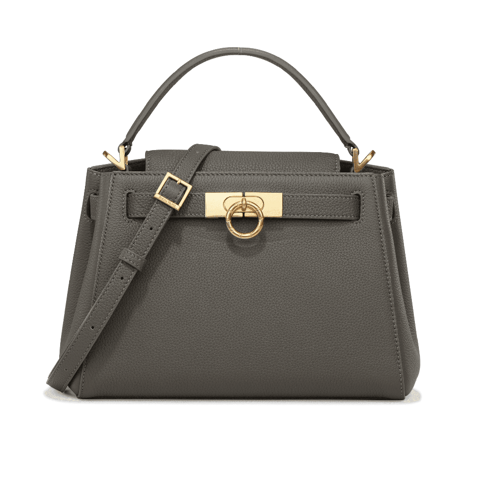 Top handle handbag is a timeless and versatile accessory that exudes elegance, sophistication, and practicality.