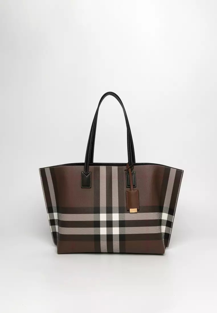 Burberry handbag sale is a renowned British luxury fashion house known for its timeless designs, quality craftsmanship, and distinctive check pattern.