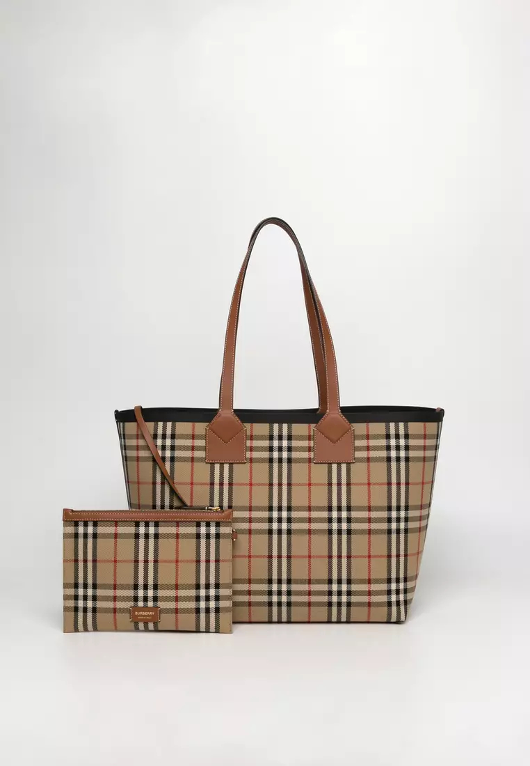 Burberry handbag sale is a renowned British luxury fashion house known for its timeless designs, quality craftsmanship, and distinctive check pattern.