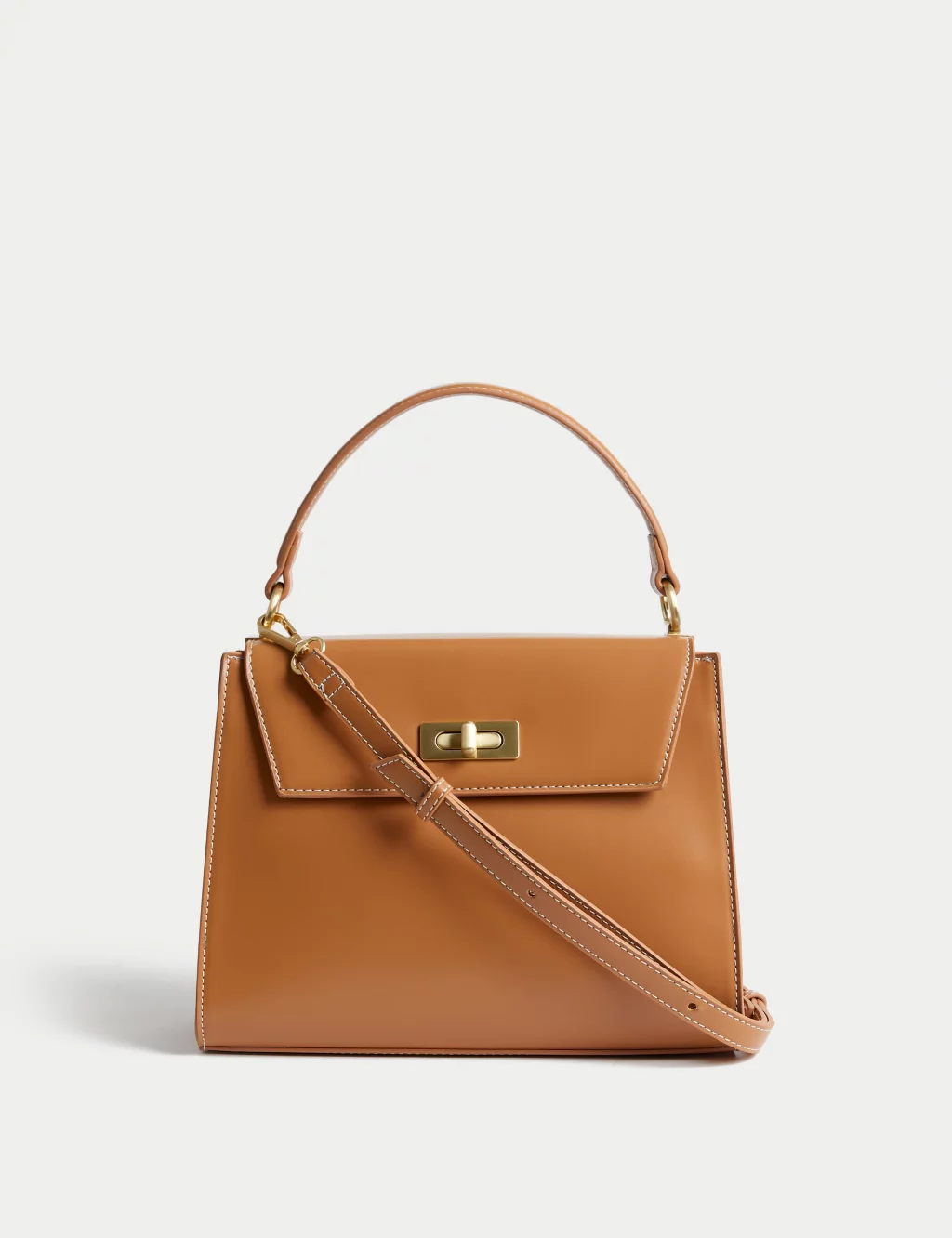 Brown handbag is a versatile and timeless accessory that complements a wide range of outfits, making it a must-have item in any fashion-conscious individual's wardrobe.