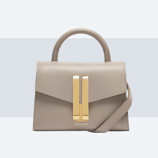 Top handle handbag is a timeless and versatile accessory that exudes elegance, sophistication, and practicality.